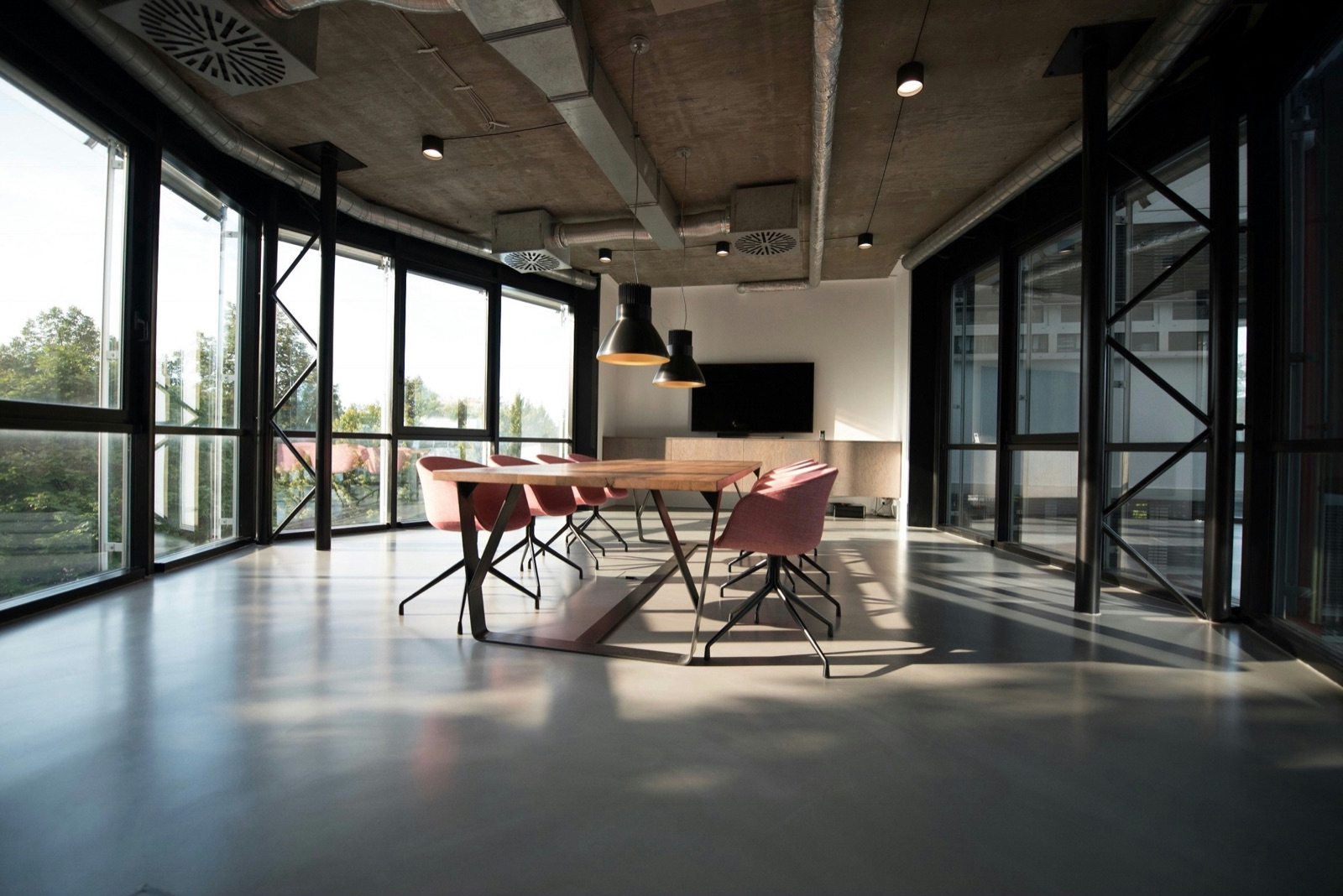 Bright modern meeting room with city light
